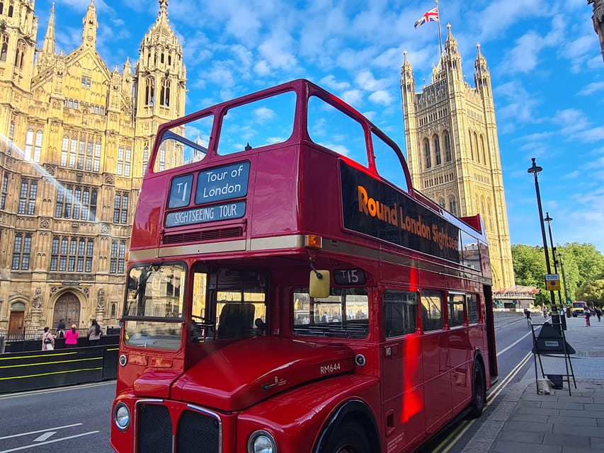 London: Guided Sightseeing Tour on a Vintage Open-Top Bus - Trafalgar Square and Piccadilly Circus: Ending in the Loud, Bright Core