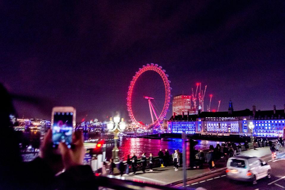 London: Nighttime Open-Top Bus Sightseeing Tour - Westminster at night: Parliament Square, Big Ben, and the drama of the river-side glow